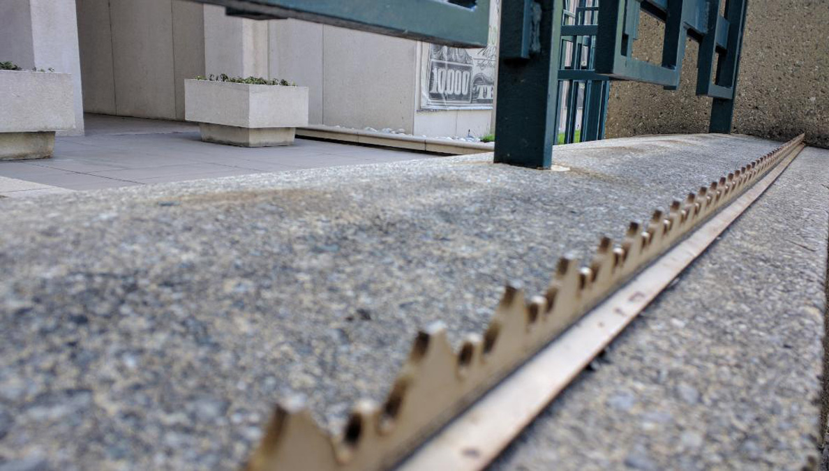Ledge with spikes to discourage skate boarding and sitting